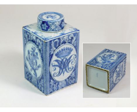 DELFT TEA CADDY. An 18th century Delft square, fluted square tea caddy & cover. Two of the raised oval panels with a monogram