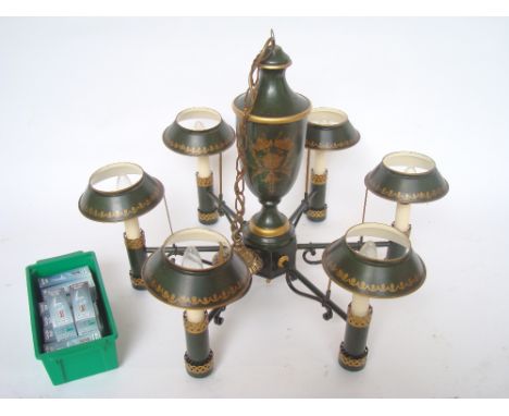 A Regency style tole six light chandelier with shades. 