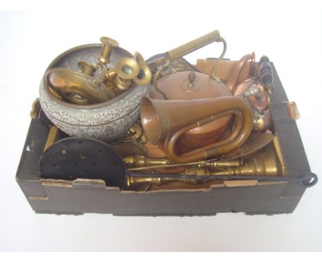 A mixed quantity of copper and brass comprising a 19th Century Indian Benares planter, kettles, candlesticks, a bugle, horse 
