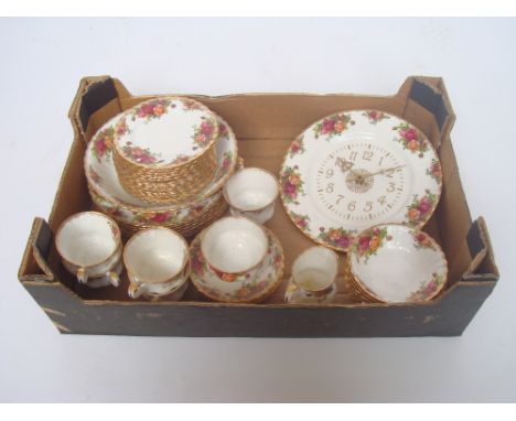 A Royal Albert Old Country Roses part service comprising eight dinner plates, eight dessert bowls, a serving bowl, fifteen sm