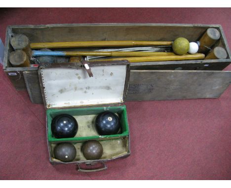 A Vintage George G. Bussey Wooden Croquet Set, (four mallets, four balls), ceramic jack, in pine case; green bowls, etc. (2)