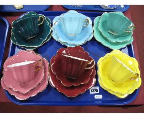 A Royal Stuart China Trio Tea Service, of six different colours:- One Tray