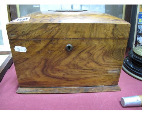 A XIX Century Walnut Ladies Work Box, with campaign style carry handle to dome top,fall front concealing single drawer, green