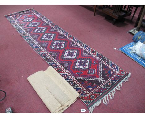 Middle Eastern Wool Tasseled Runner with seven lozenge motifs to central panel, allover decoration on red, maroon and cream g
