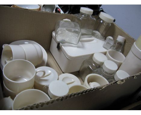 Cream Circa 1930's Picnic Ware, including Bandalasta picnic box, cup and saucers, condiment sets, flask, etc; approximately 3