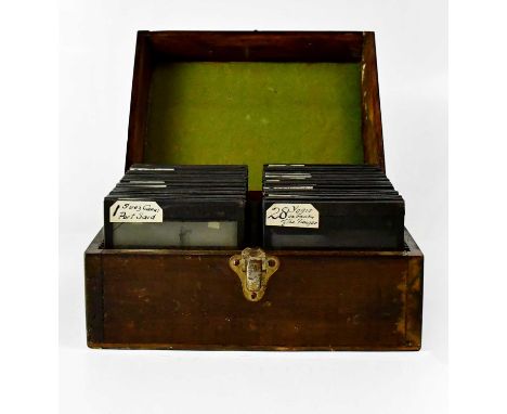 A collection of glass magic lantern slides, with images from India to include 'Yogis on Bank of the Ganges', 'Delhi Iron Pill