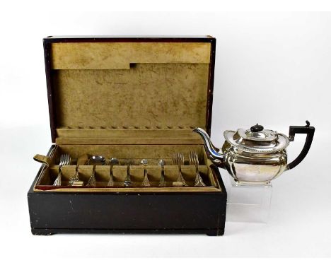 A canteen of silver-plated cutlery for six place settings, in a two-tier wooden case, and a silver-plated teapot.