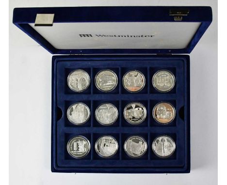 THE GOLDEN AGE OF STEAM; a collection of twelve silver proof £5 commemorative coins, each 28.28g, all encapsulated, in displa