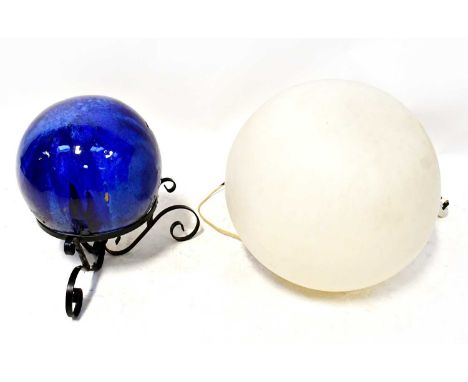 A large globular opaque white plastic table lamp, height 43cm, together with a blue ceramic ball on a metal base (2).Conditio