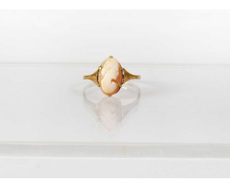 A 9ct yellow gold ring set with an oval cameo, size R, approx. 1.9g.Condition Report: - Stamped '9CT' to shank interior.