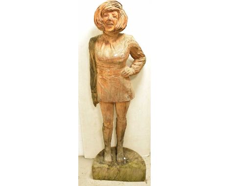 † SIMON O' ROURKE; a chainsaw carved statue of Cilla Black, height 176cm.Condition Report: † This lot may qualify for Artist 