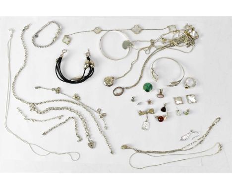 A quantity of 925 and sterling silver jewellery, to include two bangles, chains, pendants, necklaces, a circular locket, earr