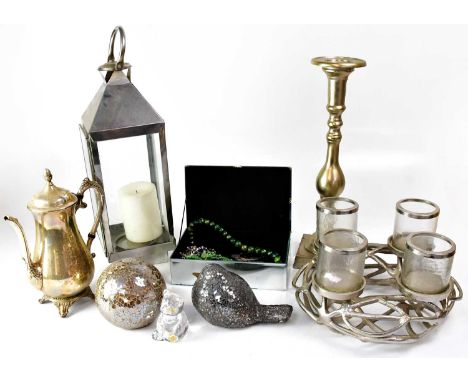 A collection of silver-coloured ornaments including a silver-plated tray, coffee pot, a naturalistic-style candelabrum and a 
