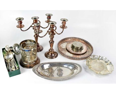 A good quantity of silver-plated items to include trays, bottle caddies and coasters, serving dishes, serving trays, flatware
