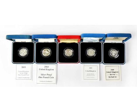 Five silver proof £1 coins, 1989, 2000, 2001, 2002, 2004, all encapsulated, in presentation cases, four with certificates (5)