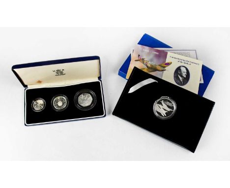 A 1994 silver proof three-coin 1994 commemorative pack, comprising £1, £2 and D-Day 50p, together with a silver proof R. J. M