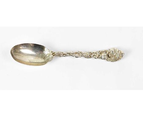 CHAWNER &amp; CO (GEORGE WILLIAM ADAMS); a Victorian hallmarked silver spoon, the handle in the form of grapes and vine leave