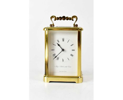 AUGUST SCHATZ & SONS; a brass-cased carriage clock, the dial set with Roman numerals, height excluding handle 13cm.  Conditio
