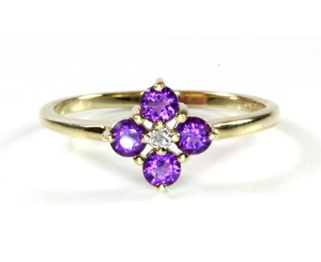 A 9ct yellow gold amethyst and diamond set ring, (O).