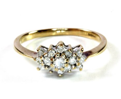 A 9ct yellow gold diamond set cluster ring, (O).