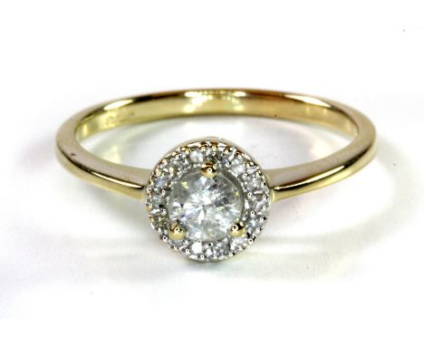 A 9ct yellow gold diamond set halo ring, centre diamond approx. 0.30ct, (L.5).