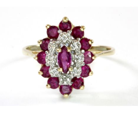 A 9ct yellow gold ruby and diamond set cluster ring, (M).