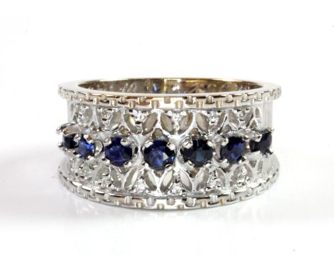 A 14ct white gold sapphire and diamond set ring, (O).