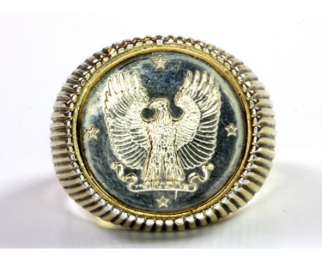 A 925 silver gilt signet ring set with a 14ct yellow gold coin, (R.5).