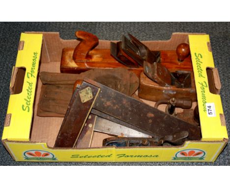 A box of mixed wood working tools.