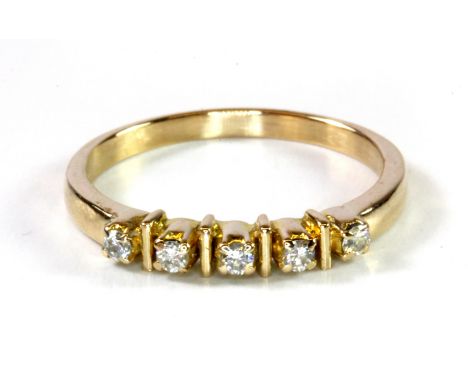 A 14ct yellow gold (stamped 14ct) diamond set ring, (M).