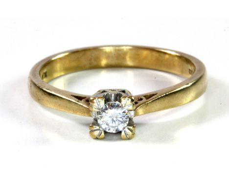 A 9ct yellow gold diamond set solitaire ring, (O).