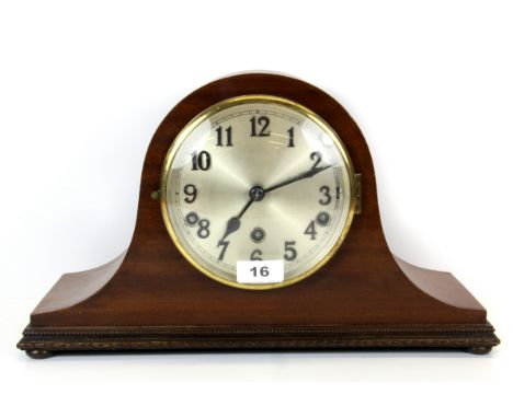 A mahogany veneered chiming mantle clock, W. 39cm, H. 23cm.
