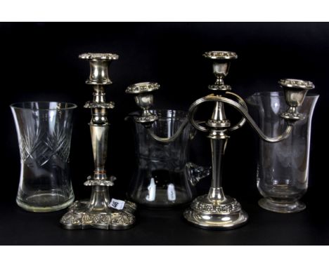 A silver plated candelabrum, candlestick and three good glass items.