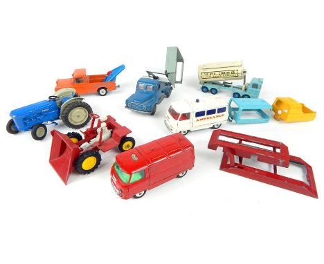 An assortment of retro diecast model vehicles including a Britains Fordson Tractor, Budgie model No 324 Douglas Prospector Du