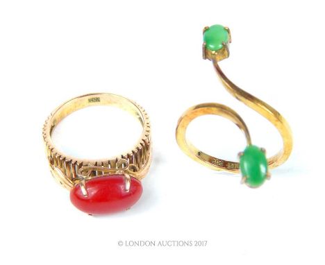2 x yellow gold rings consisting of a 14 ct yellow gold ring with a two pronged design set with two green jade cabochon stone