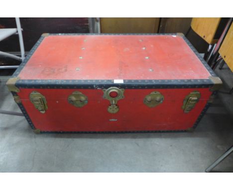 A red steamer trunk 