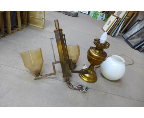 An Art Deco brass electrolier (missing shade) and a brass table lamp 