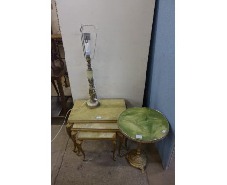 A brass and onyx table lamp, nest of tables and an occasional table 