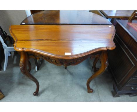 A French style carved hardwood console table 