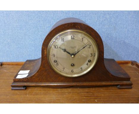 An oak mantel clock 
