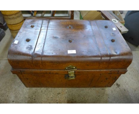 A tin steamer trunk 