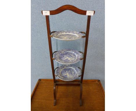 A mahogany cakestand with Copeland Spode blue and white tea plates 