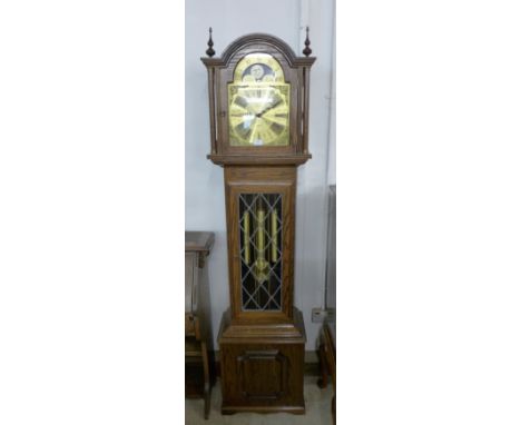 A Fenclocks, Suffolk oak triple weight longcase clock, with moon-phase rolling dial 