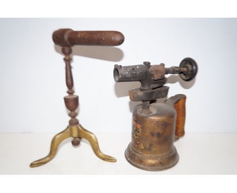 Georgian goffering iron on brass down swept-legs together with a vintage blow lamp 