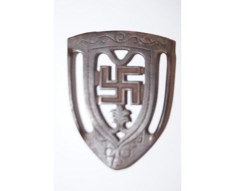 Cast iron trivet stand depicting swastika 