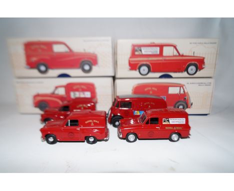 4 Corgi royal mail vans (Boxed)
