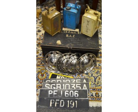 A Valor petrol can; others; a tin trunk, RAF;1964 mini wheel trims, number plates Singapore and Malayain 