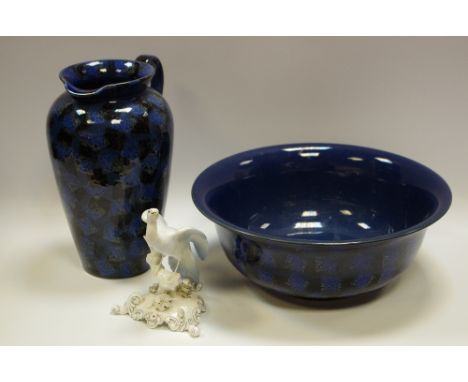 A Royal Crown Derby model, Chelsea bird, washed in blue, printed mark;  a Denby Eclipse wash jug and bowl