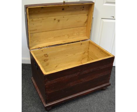 A Victorian stained pine domed top trunk, turned feet c.1880