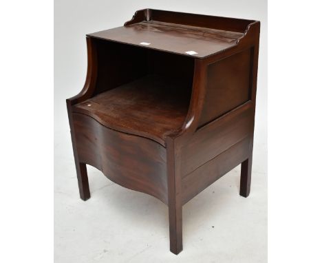 A George III mahogany step commode of serpentine outline.